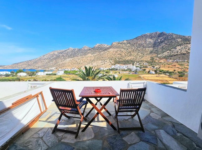 table chairs balcony sifnos